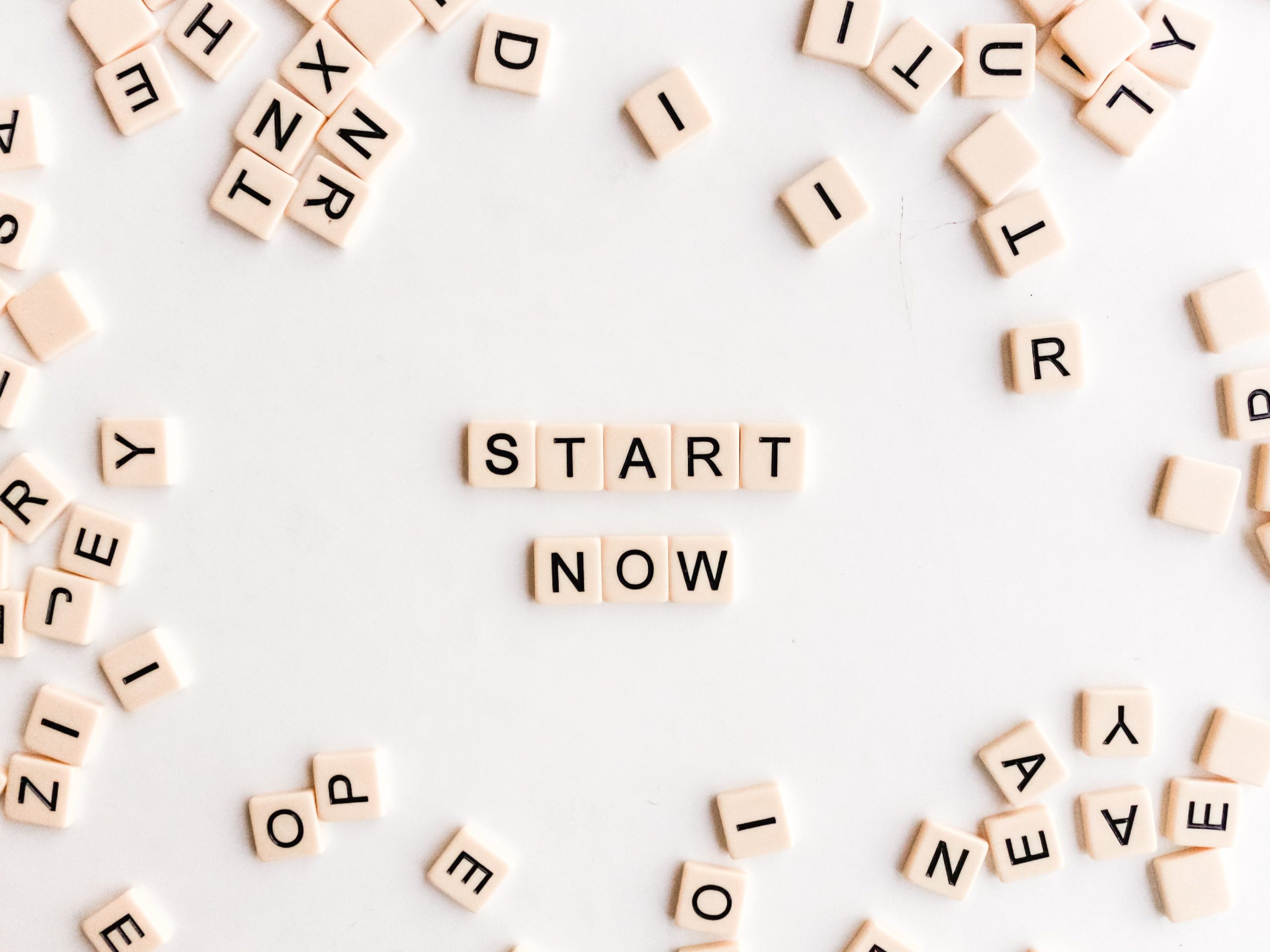 Start now written in scrabble blocks