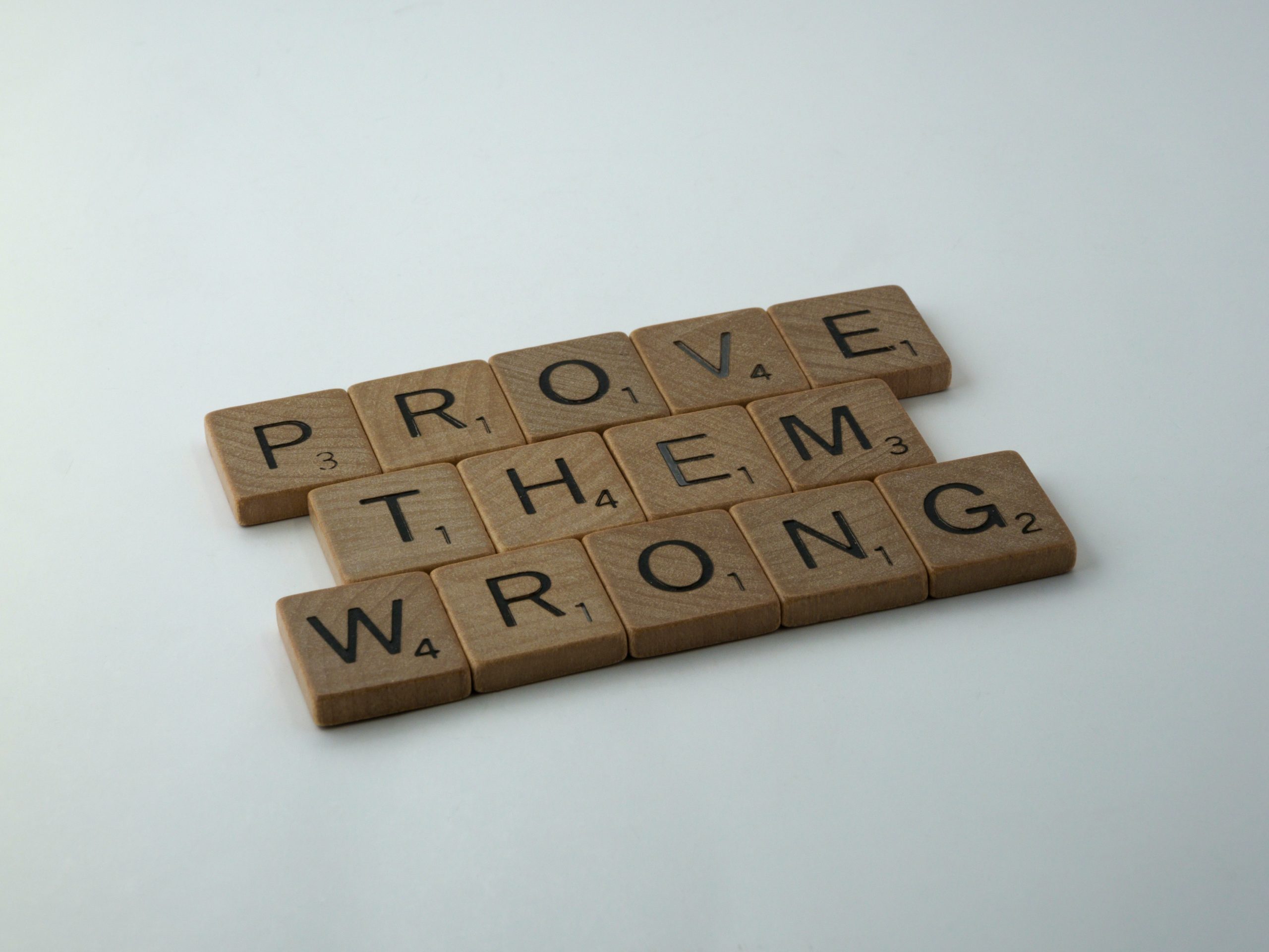 Scrabble board that says prove them wrong - Good Revenge