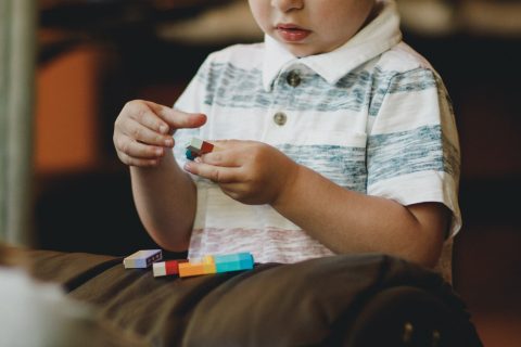 Boy playing with toys - ADHD in Children