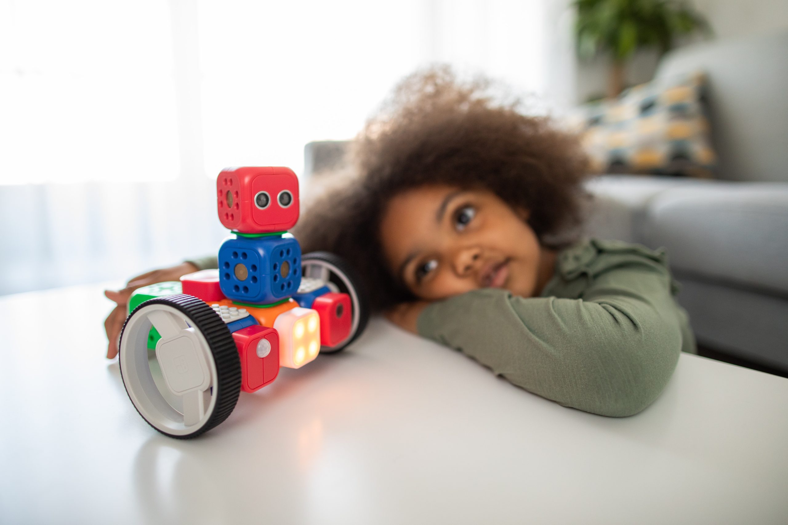 Sad child playing with toy - ADHD in children